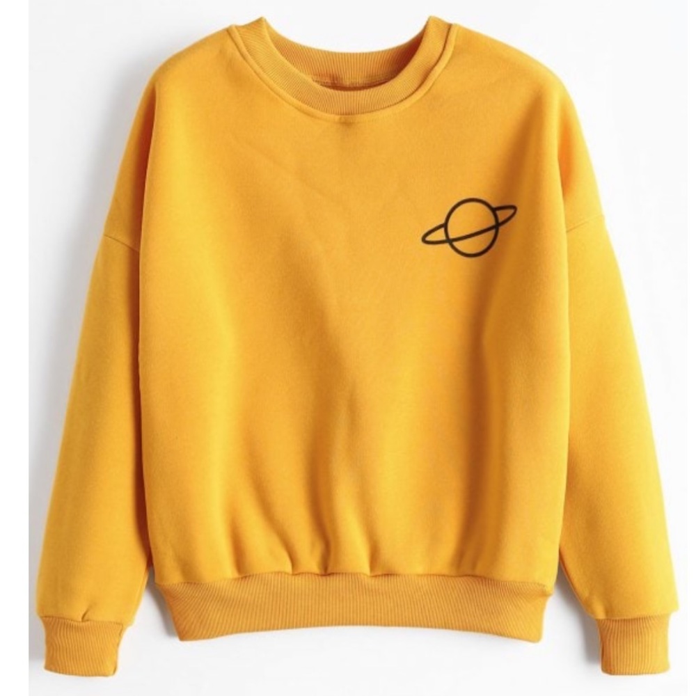 Yellow sweater with Saturn celestial design